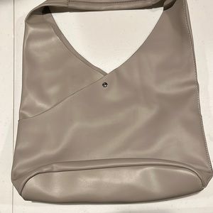 New gray purse with snap closure, interior bag included